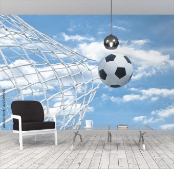 Picture of 3d rendering of a football ball flying away from inside the gate net and tearing it